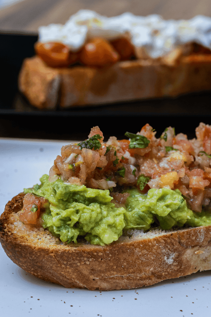 Burrata Roast and Avo Mash: sourdough toasts with roasted tomatoes, burrata and smashed avocado